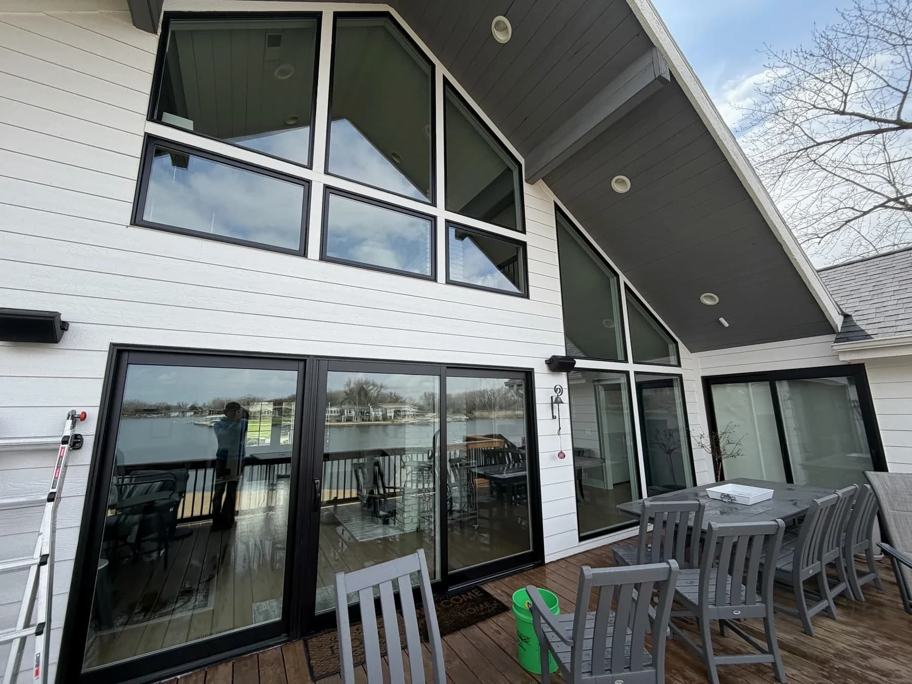Two-story window cleaning on an Omaha-area lake home