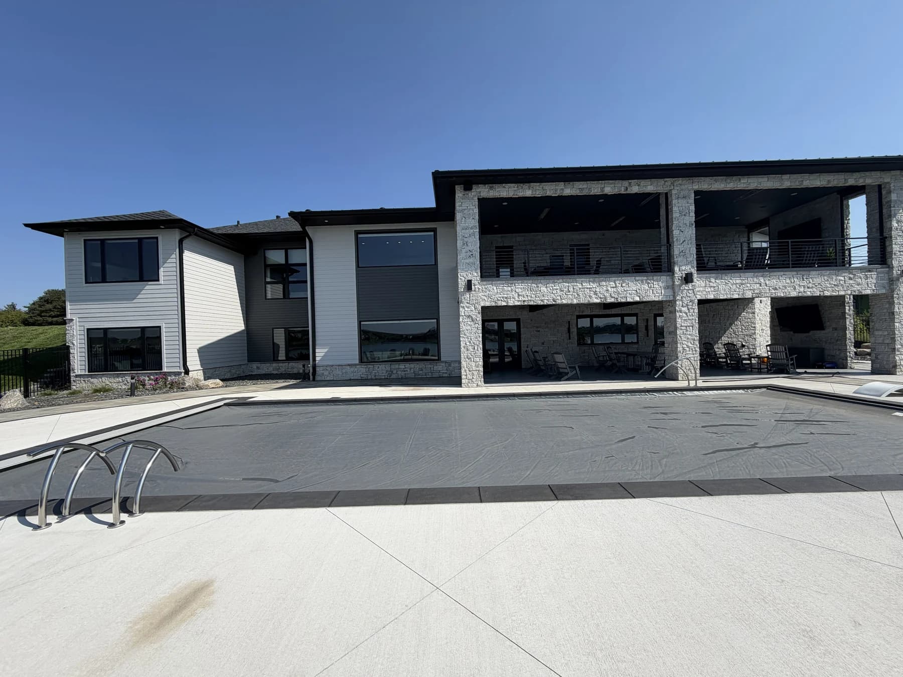 A modern Omaha property seen across the pool deck