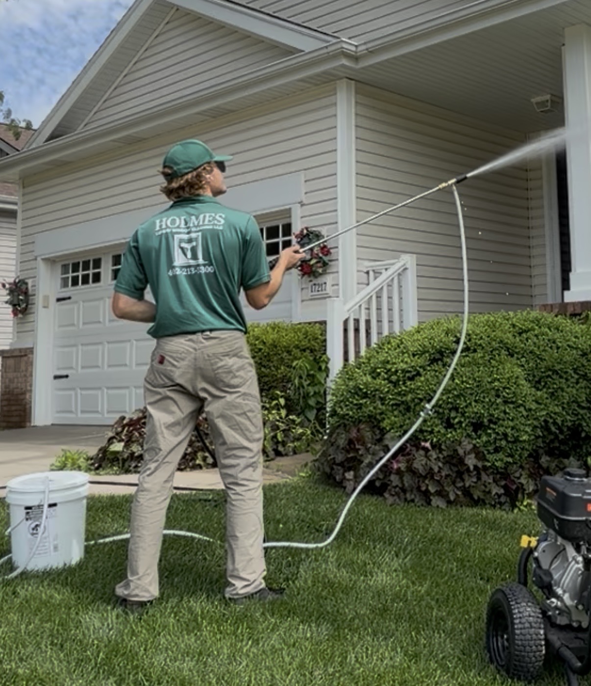 Pressure washing a driveway