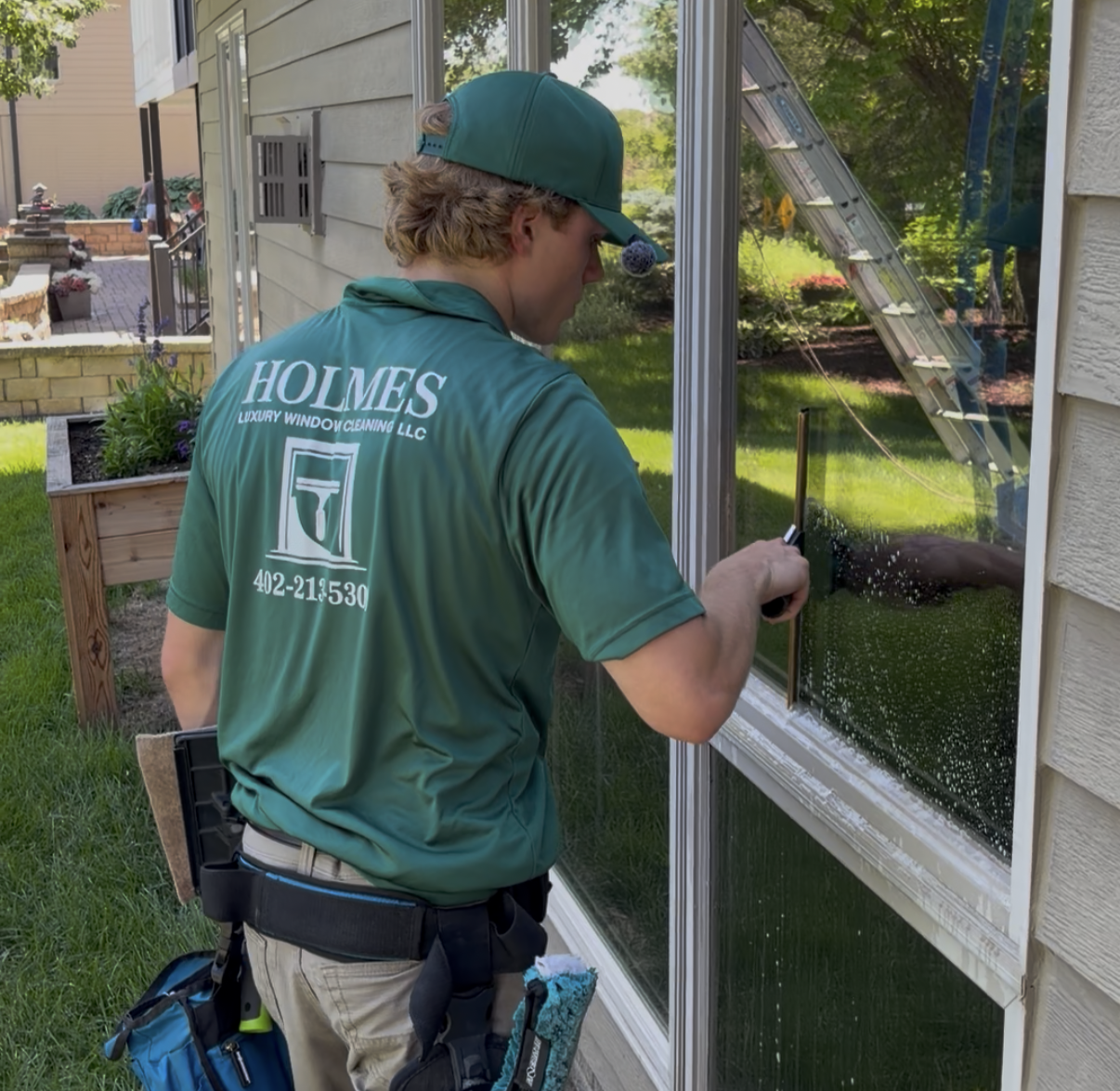 Window cleaning on a luxury home